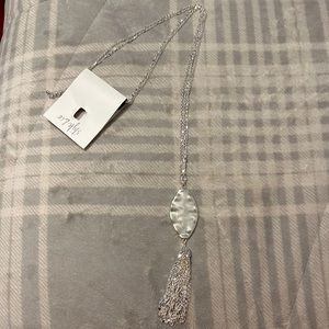 Long silver statement pendant necklace